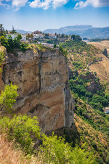 Fototapeta na wymiar Ronda, Spain, a city in the Spanish province of Málaga, stand along a cliff on a sunny, summer day.