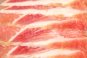 Thin slices of smoked pork brisket