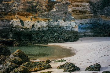 Stone beach of the Atlantic Ocean at dawn. Lagos. Portugal