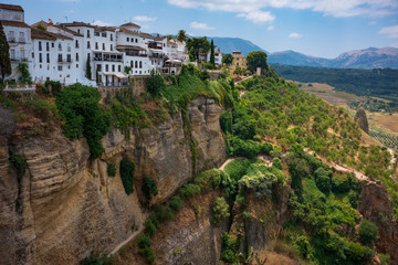 Fototapeta na wymiar Ronda, Spain, a city in the Spanish province of Málaga, stand along a cliff on a sunny, summer day.