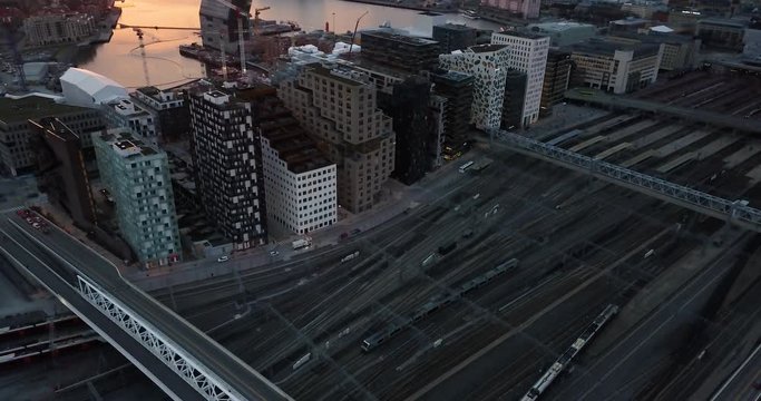 Aerian Drone revealing sunset over the fjord of Barcode area in Oslo, Norway