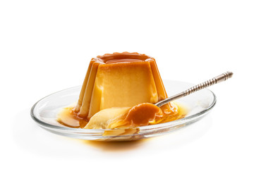 Creme caramel custard pudding isolated in white