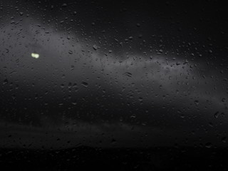  raindrops on gray storm day