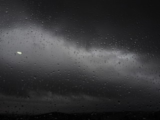  raindrops on gray storm day
