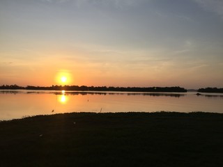 sunset on lake in evening