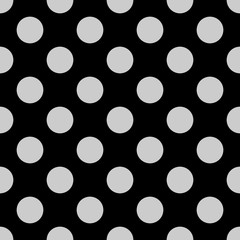 Seamless vector pattern with grey polka dots on a black background