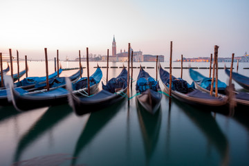 Sunrise at Venice with gondola and island of st george view