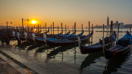 Sunrise at Venice with gondola and island of st george view © k_samurkas
