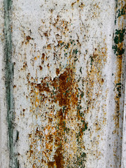 Rusty brown metal wall with yellow patterns. metal rust texture background.