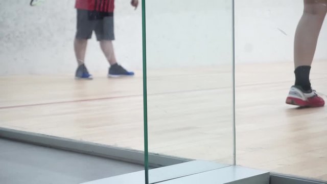 Playing squash legs moving on the floor