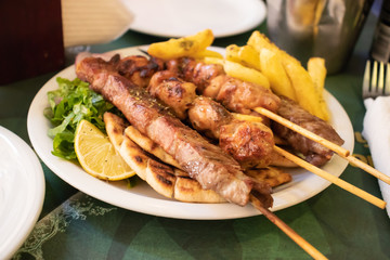 Traditional souvlaki greek dish with chicken and meat in athens