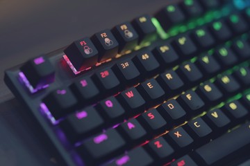 Close up of Computer RGB gaming keyboard, Illuminated by colored LED