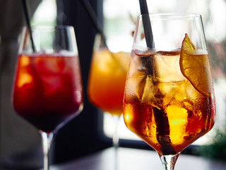 Wine in glass with ice, dry orange