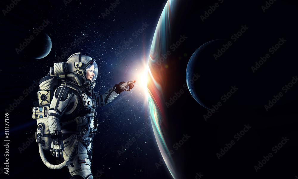Wall mural exploring outer space. mixed media