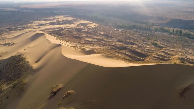 Desert, flying over a dune