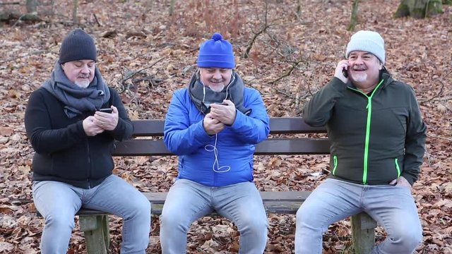 Man using his smartphone for a video call, texting and a regular phone call. The same man interacting as multitasking. Video with special effects in HD.