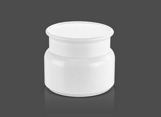 White plastic cream pot isolated on gray background with clipping path