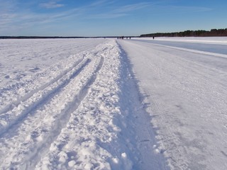 Fototapeta na wymiar Frozen road in Northern Sweden, Lulea