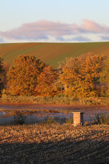 hunting pulpit in rural fall landscape