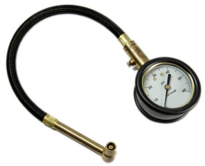 Corded tire gauge isolated on white background.