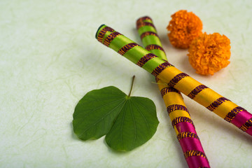 Indian Festival Dussehra, showing golden leaf (Bauhinia racemosa) and marigold flowers with Dandiya...