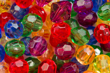 Fototapeta premium Multi-colored glass beads for beads and bracelets shot large on a white background