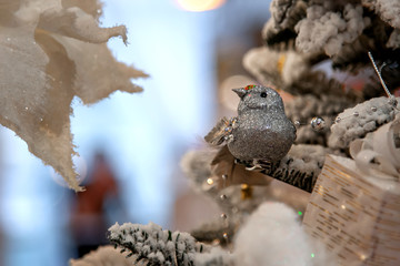 silver bird on a christmas tree
