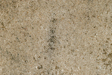 The weathered old particle board surface with stains is affected. Abstract particle wood  texture background