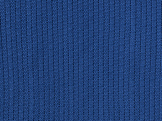 Handmade knitting texture in classic blue color background. color of the year 2020 pantone