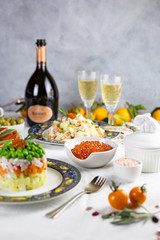 estive New Year's table in the Russian style: champagne, Olivier and red caviar