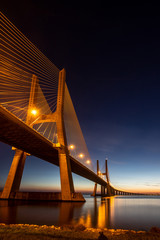 bridge Vasco da Gama in Lisboa, Portugal to the sunrise