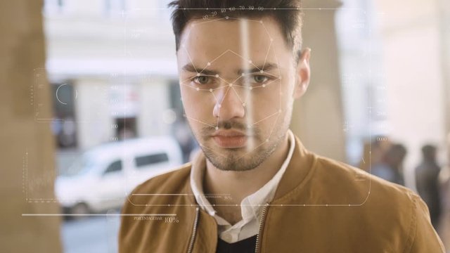 Future. Face Detection. Technological 3d Scanning. Biometric Facial Recognition. Face Id. Technological Scanning of the Face of Handsome Businessman for Facial Recognition. Shoted by Arri Alexa Mini