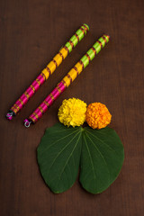 Indian Festival Dussehra and Navratri, showing golden leaf (Bauhinia racemosa) and marigold flowers...