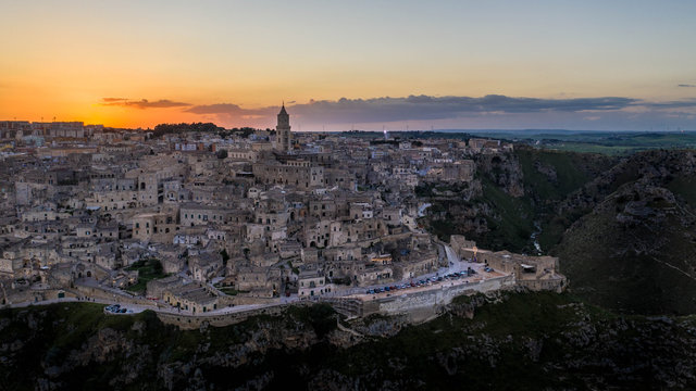 Mattera city in Italy at sunset from drone