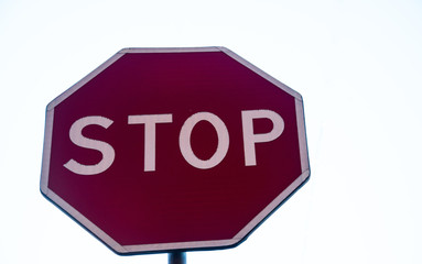 Stop road sign isolated with white background