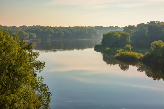 Summertime morning by the river, outdoor background