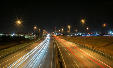Car light trails on highway A12 in The Netherlands at night.