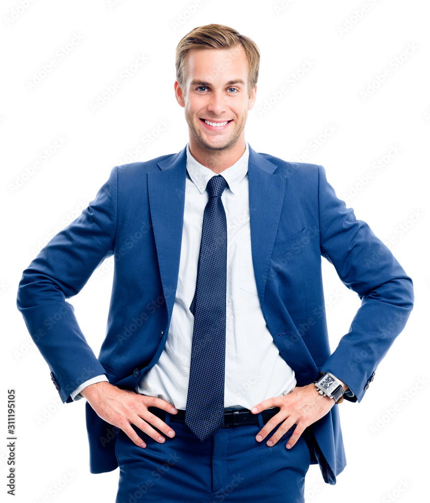 Wall mural Portrait of happy smiling young businessman in blue confident suit, isolated against white background. Success in business concept studio picture.