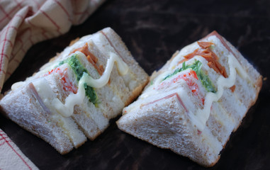 The triangle sandwiches on the table