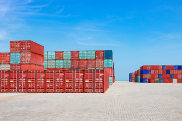 Fototapeta premium Containers on the wharf. International shipping logistics.