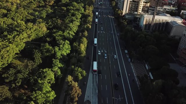 Xinsheng Road Traffic by Daan Forest Park, Taipei, Taiwan, Birds Eye Aerial View on Golden Hour Sunlight
