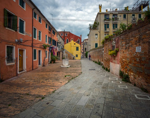 Gates and small streets of the old city of Venice. Italy.
