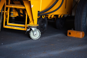 Castor wheels of  Electric Tractor, forklift at industry. Vehicle Concept.