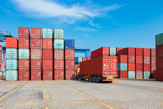 Containers on the wharf. International shipping logistics.