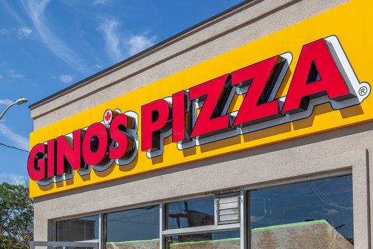 Niagara Falls, Ontario, Canada - September 18, 2019: Sign of Gino's Pizza restaurant in Niagara Falls; Gino's Pizza is one of the most popular pizzas in Western Ontario, Canada. 