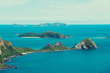 Top view island and blue water see in a day.