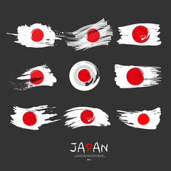 Collection of Japan flag with brush stroke background 