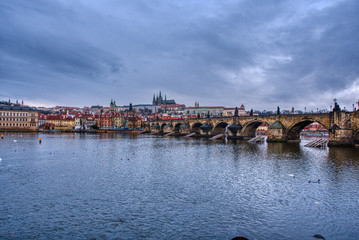 Fototapeta na wymiar krasluv bridge with castle and cathedral with beautiful cloudy sky