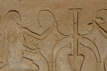 Egyptian ancient pictures on the stone wall