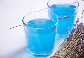 Lavender Lemonade and lavender bouquet. Natural refreshing summer drink.